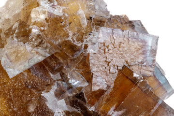 Macro mineral stone yellow Fluorite on a white background