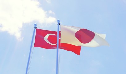 Turkey and Japan, two flags waving against blue sky. 3d image