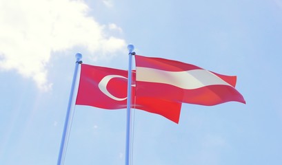 Turkey and Austria, two flags waving against blue sky. 3d image