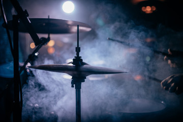 Concert drums on stage in smoke