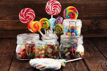 candies with jelly and sugar. colorful array of different childs sweets and treats.