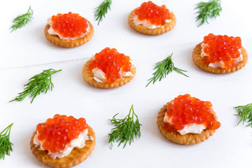 Basis for a banner with sandwiches with red caviar. Salmon caviar for print design, web site, banner, flyer. Appetizer with red caviar