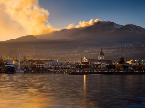 Volcanic ash plume at sunset