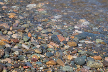 Multi-colored wet pebbles