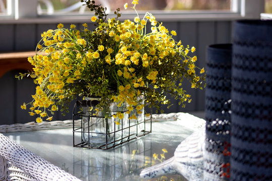 Tiny Yellow Flower Bouquet on Coffee Table