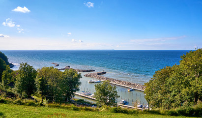 View from the mountain to the port of Lohme with motorboats and sailboats. Mecklenburg-Vorpommern, Germany