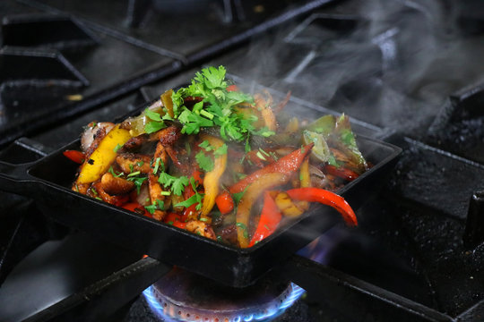 Mexican Fajitas On Sizzling Plate