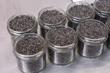 Jars with black caviar