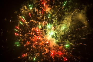 Fototapeta na wymiar Beautiful colored fireworks in Prague. New Year. 