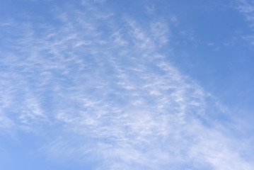 Blue sky background with clouds.
