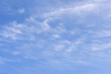 Blue sky background with clouds.