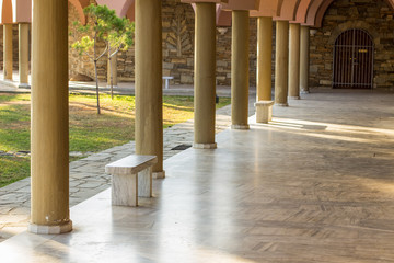 antique classic palace covered columns alley way and marble bench building landmarks concept 