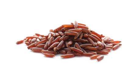 Pile of brown rice on white background