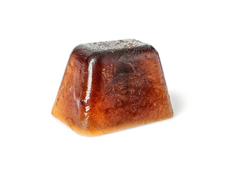 Ice cube made with coffee on white background