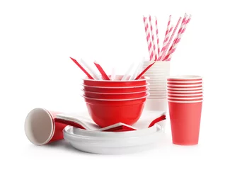 Rucksack Plastic dishware isolated on white. Picnic table setting © New Africa