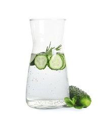 Jug of fresh cucumber water on white background