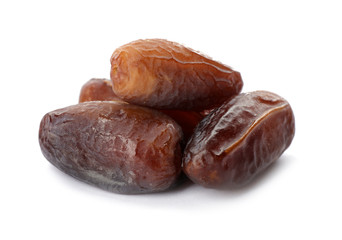 Sweet dates on white background. Dried fruit as healthy snack