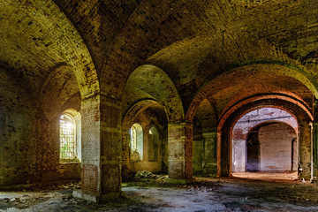 Large ancient vaulted hall of abandoned building