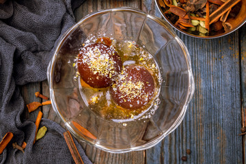 the Gulab jamun indian food on wooden background