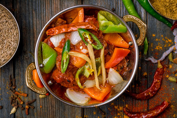 kadai chicken indian food or indian curry on wooden background