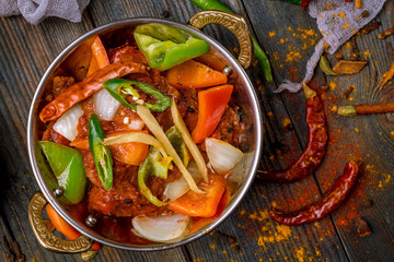 kadai chicken indian food or indian curry on wooden background