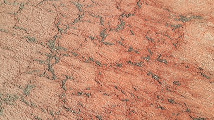 Red colored damaged road or paved pathway with crackes