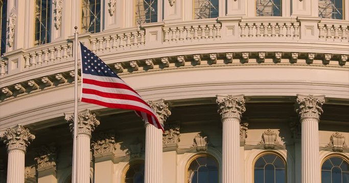 American flag symbol United States Capitol and the Senate Building, Washington DC USA