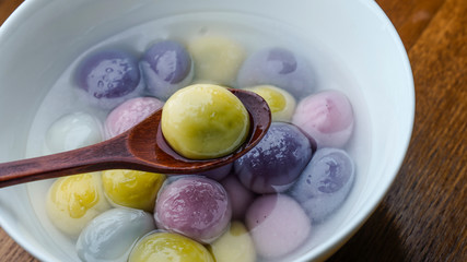 Coloured dumplings in bowls