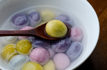 Coloured dumplings in bowls