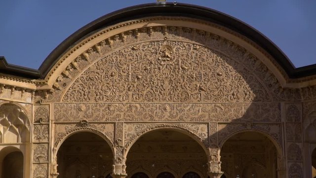 Steady, medium close up, exterior shot of the arch of The Borujerdi House Garden in Kashan.