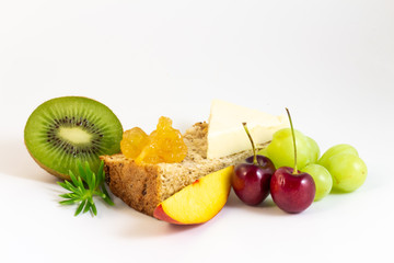 Fresh fruits for breakfast with wholemeal bread.