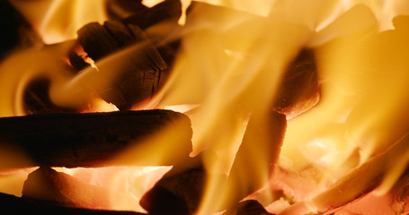 Hot red charcoals in a bonfire