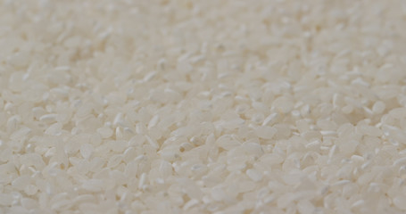 Stack of white uncooked rice