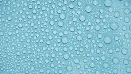 drops water on blue background