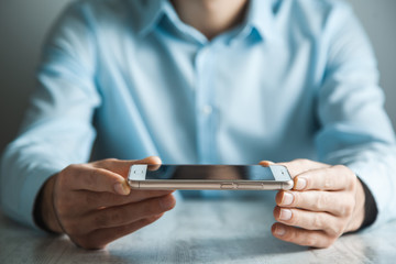 man hand smart phone