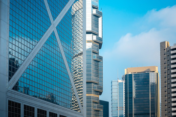 Obraz premium Bottom up view of Modern office building in Hong Kong