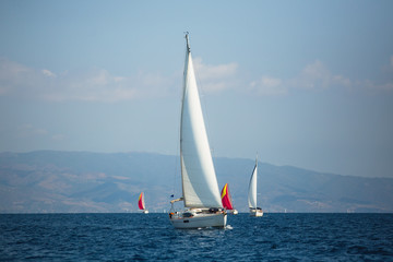 Naklejka premium Sailing luxury boats in the yacht regatta, Aegean Sea Greece.