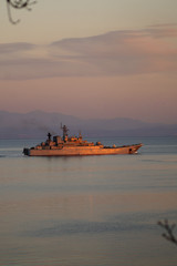 Warship in the setting sun