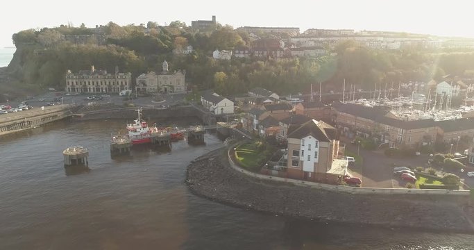 Aerial, sun sets over Penarth Harbor