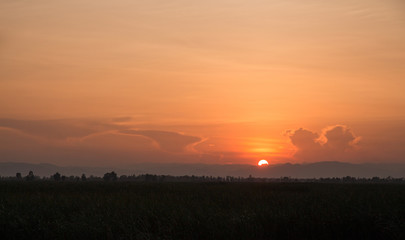 Landscape of sunset over misty mountains in the evening,Nation park of Thailand