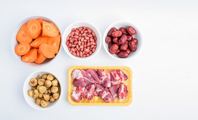 Preparing soup ingredients / pig bones