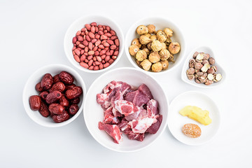 Preparing soup ingredients / pig bones