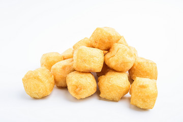 Golden oil tofu on white background