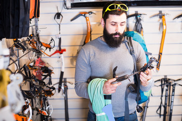 Fototapeta premium Buyer considers the types of rock equipment