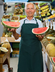 Salesman offering fresh fruits and vegetables