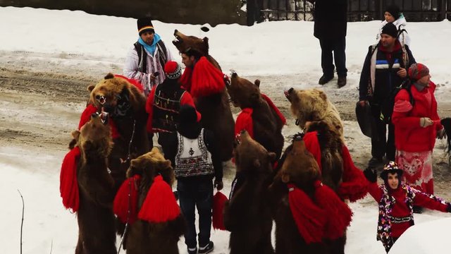 Romanian rituals performed by participants with bells, sticks and drums making noise to dispel the malevolent spirits. Bear Dance being the most popular