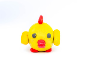 yellow chicken made from clay