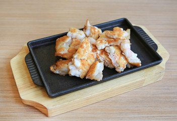 Teppanyaki squid egg on hot plate. Traditional Japanese food.