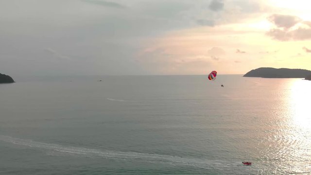 Slow pan showing parasailer in Langkawi