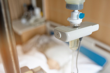 Selective focus drip saline drip hospital room,Medical Concept, treatment patient emergency and injection drug infusion care chemotherapy concept.hospital background